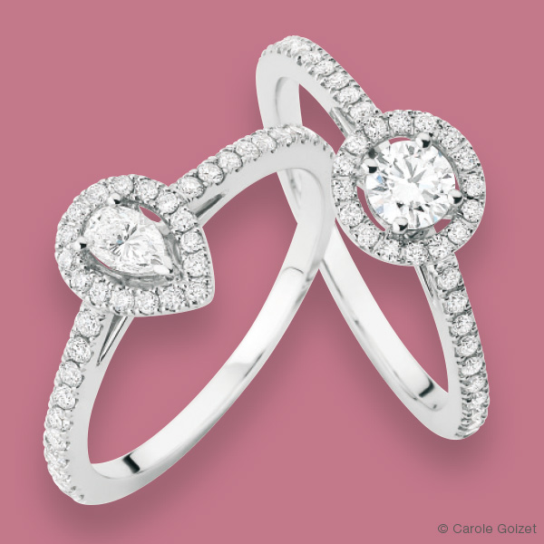 Bague « Entourage » Or gris, diamants et centre taille poire ou brillant